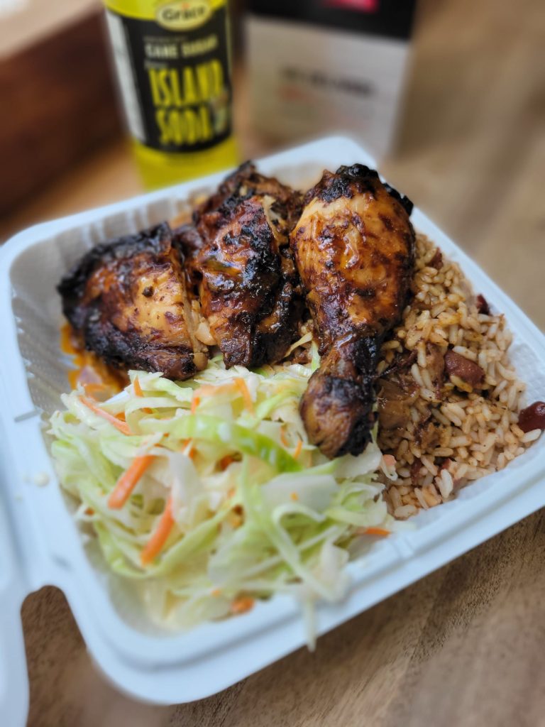 Jerk Chicken Meal Box with rice and peas and coleslaw